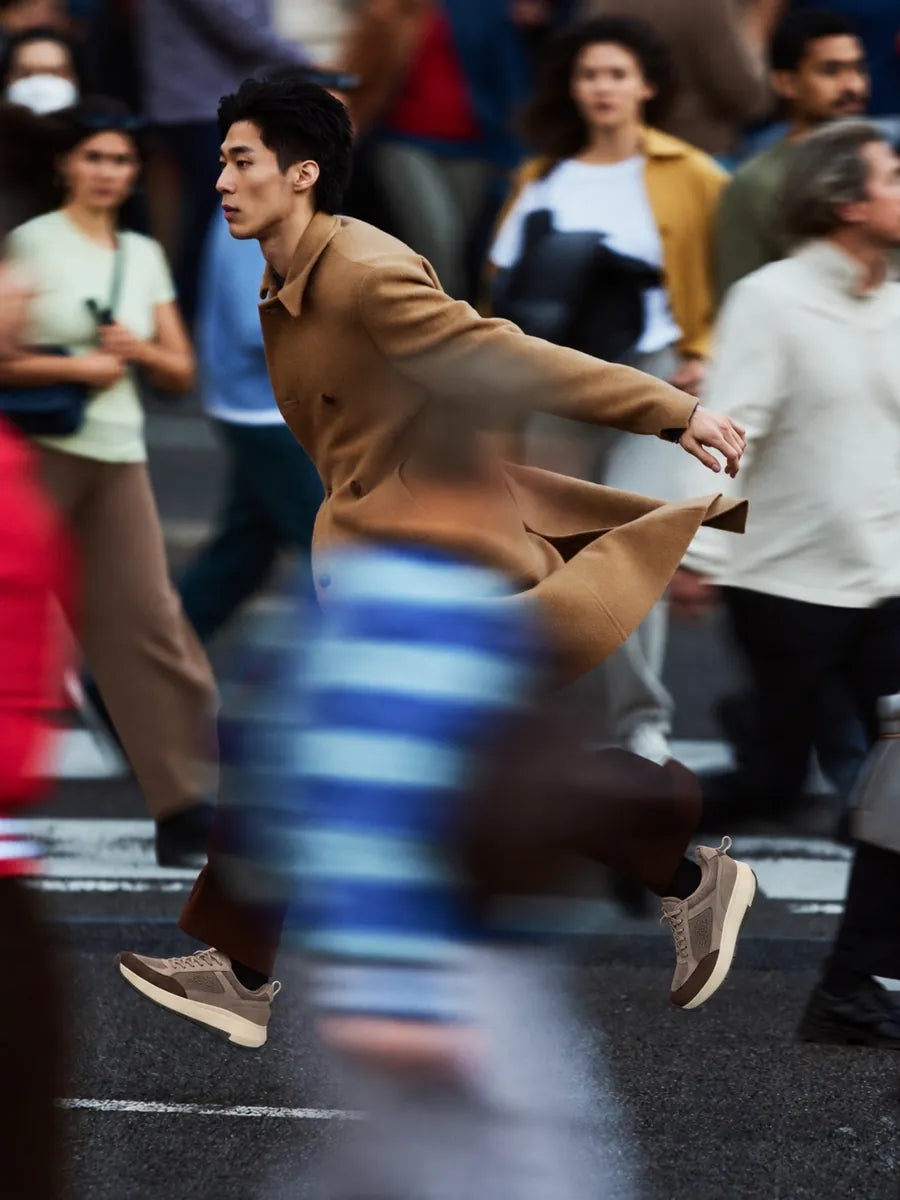 Crossing a busy street in motion